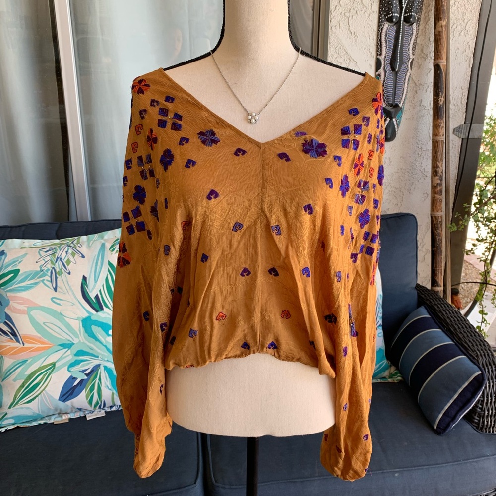 Free People beautiful detailed top.